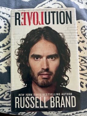 Revolution by Russell Brand — White Back Cover with Black & Red Text